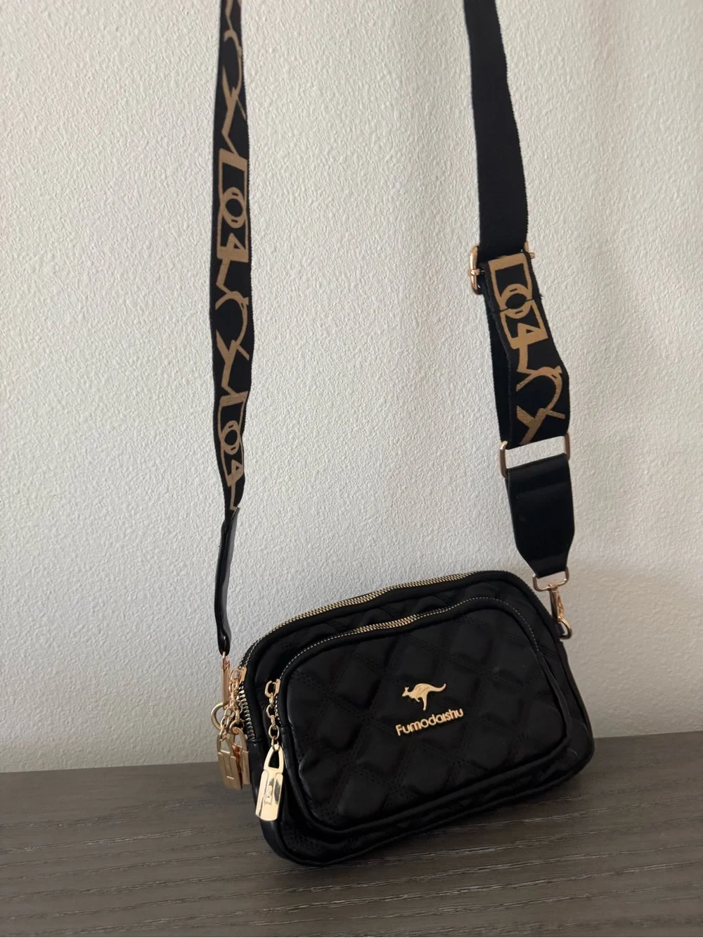 Quilted Black Crossbody Bag with Logo Strap